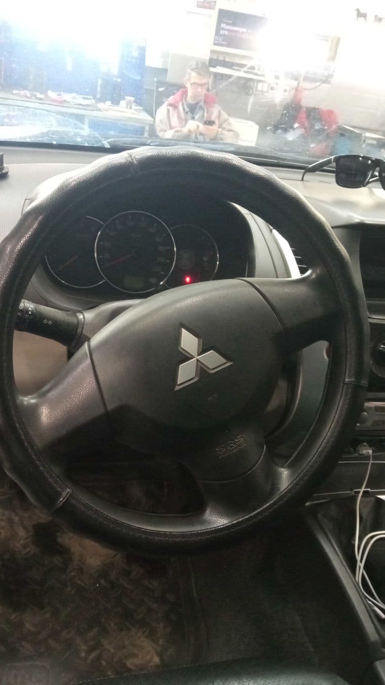 Mitsubishi Pajero Sport, 2011 - вид 4