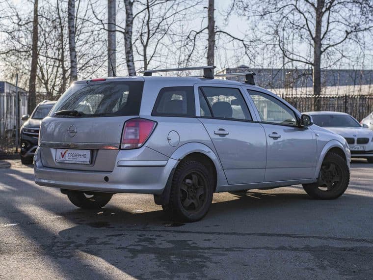 Opel Astra 2011 года, 174 836 км - вид 2