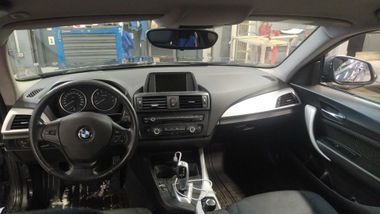 BMW 1 серия 2012 года, 236 310 км - вид 5