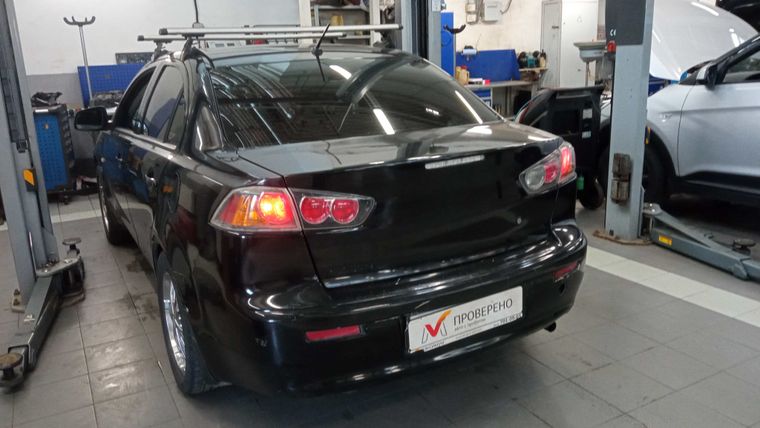 Mitsubishi Lancer 2010 года, 179 434 км - вид 3