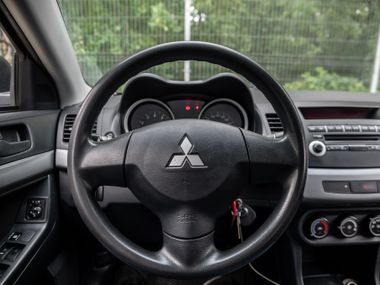 Mitsubishi Lancer 2010 года, 179 434 км - вид 6