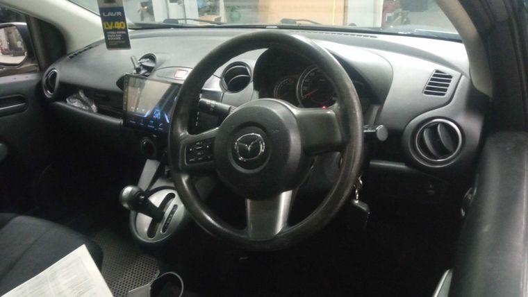 Mazda Demio 2014 года, 233 325 км - вид 5