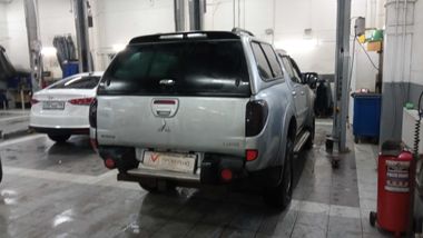 Mitsubishi L200 2012 года, 192 498 км - вид 3